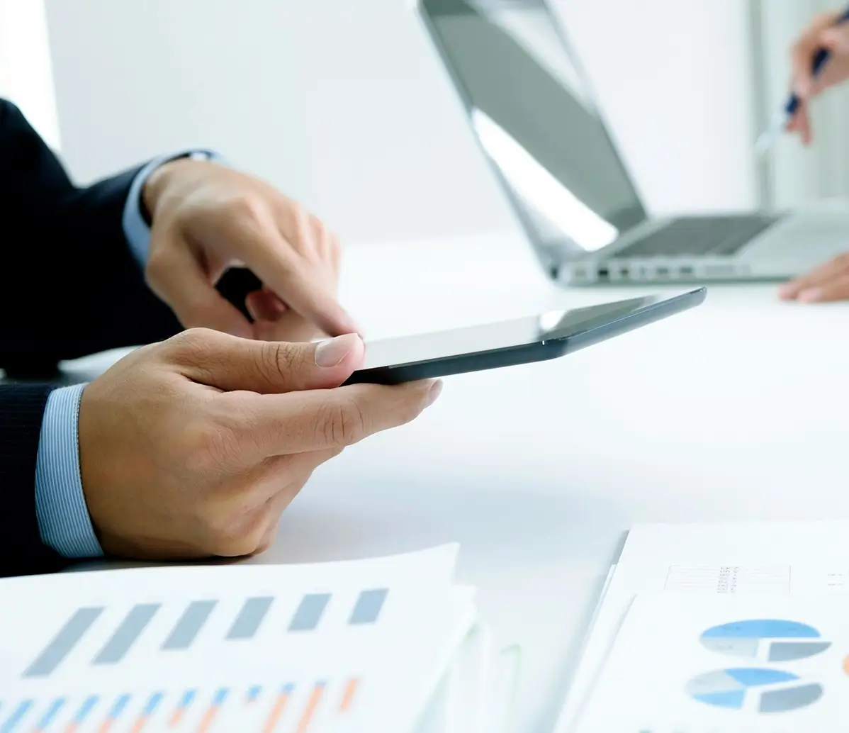 Cyber security consultant working on laptop